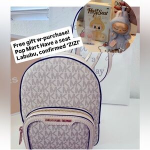Michael Kors Cream and Gray Monogram Back pack. Brand new with tags.